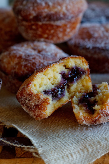 Baked doughnut muffins with blueberry jam
