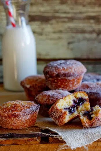 Baked doughnut muffins with blueberry jam Baked doughnut muffins with blueberry jam