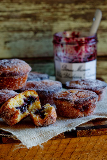 Baked doughnut muffins with blueberry jam