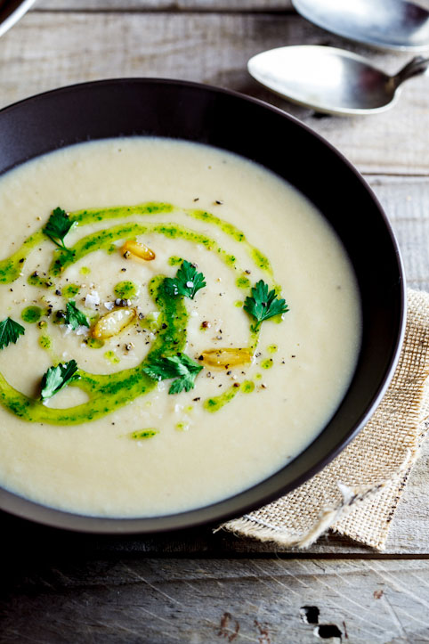 Celeriac & roasted garlic soup with parsley oil