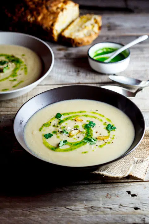Celeriac & roasted garlic soup with parsley oil