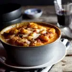 Baked gnocchi with bacon, tomato and mozzarella