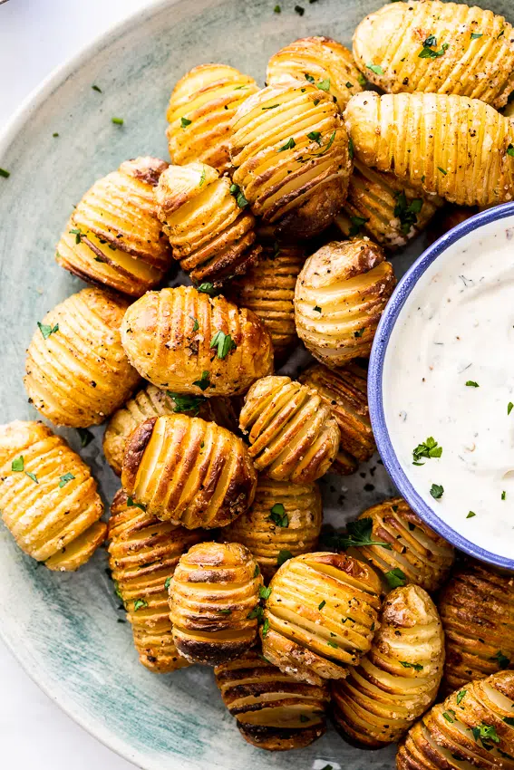 Mini Hasselback potatoes with sour cream dip