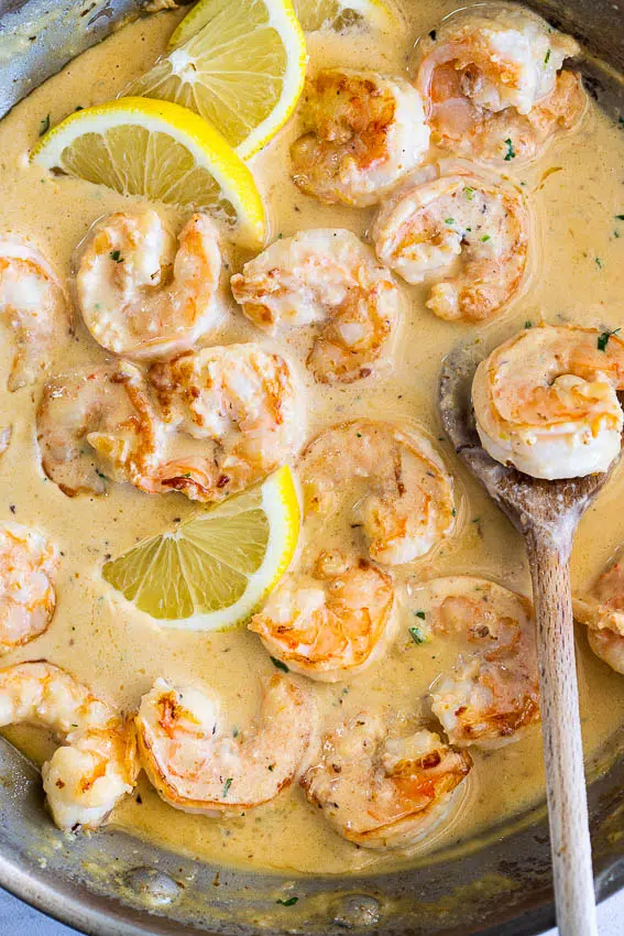 Juicy shrimp cooked in creamy lemon sauce. Pasta al limone with shrimp.