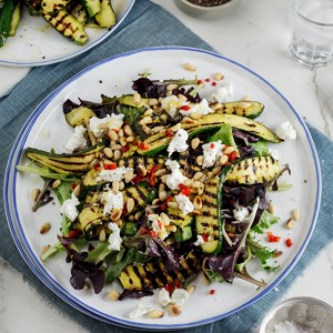 Marinated zucchini salad with goat's cheese and pine nuts