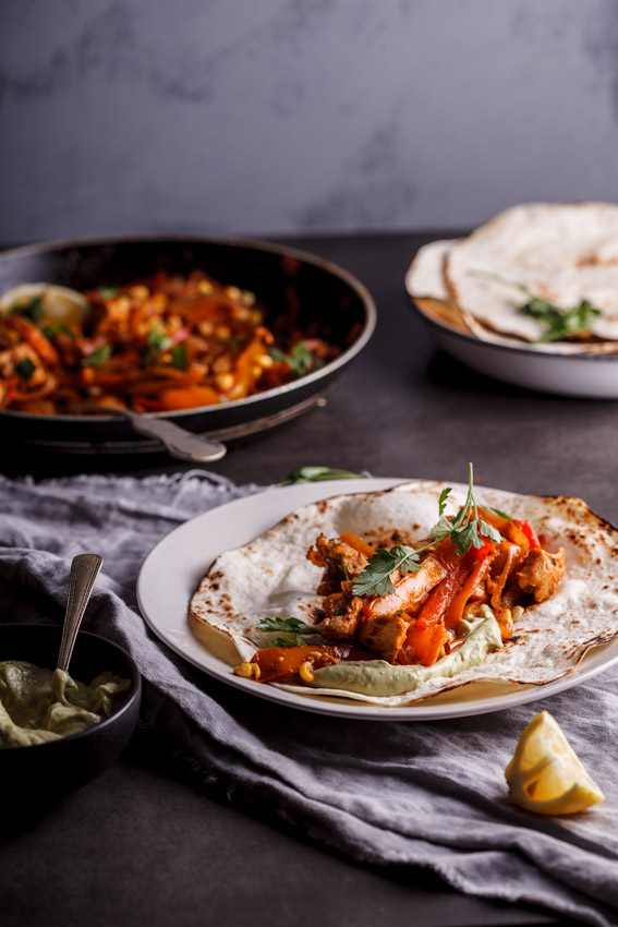 Chicken faijtas with roasted corn and avocado cream