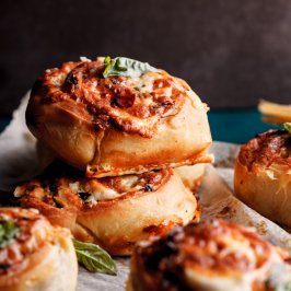 Pizza rolls with sundried tomatoes, basil and garlic butter