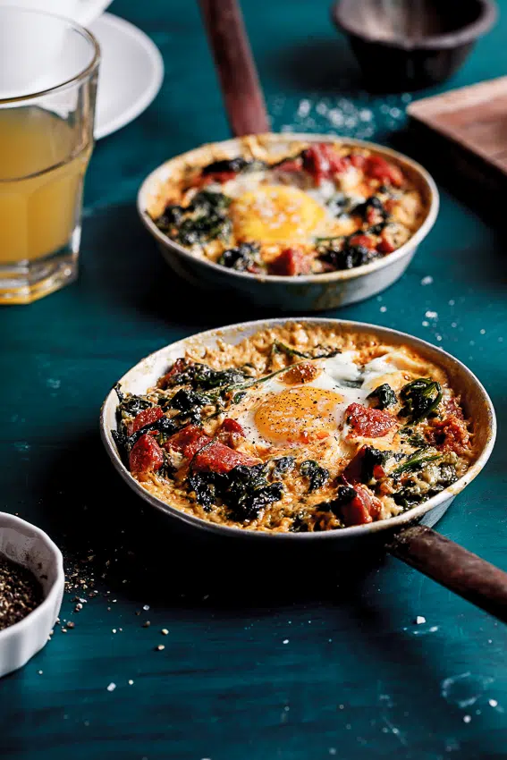 Baked eggs with spinach, chorizo and feta