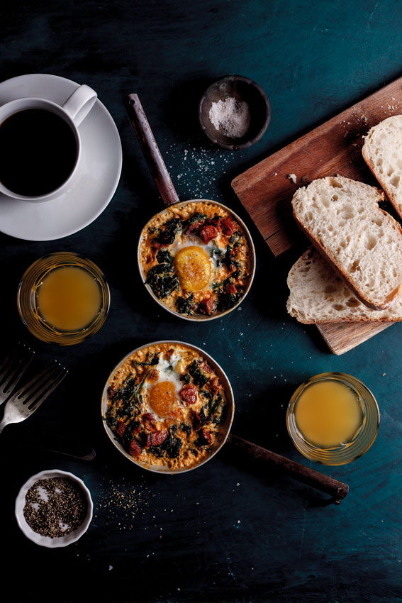 Baked eggs with spinach, chorizo and feta