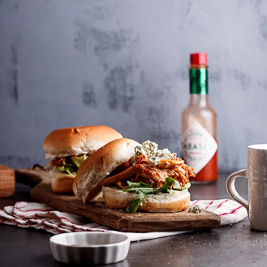 Buffalo chicken sliders with blue cheese sauce