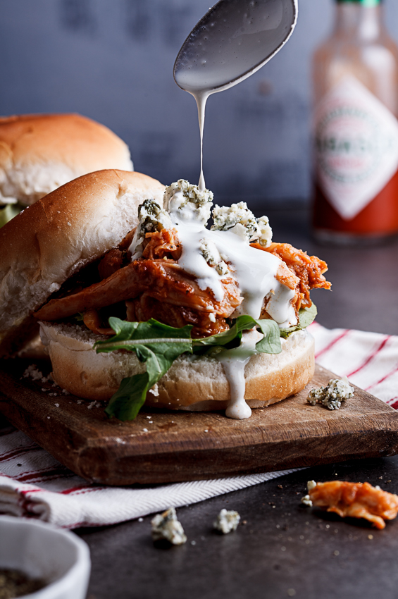 Buffalo chicken sliders with blue cheese sauce