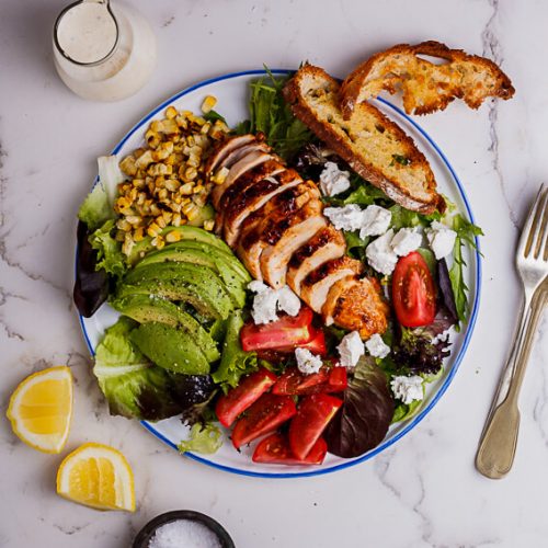 Spicy roast chicken salad with ciabatta crisps and creamy lemon ...