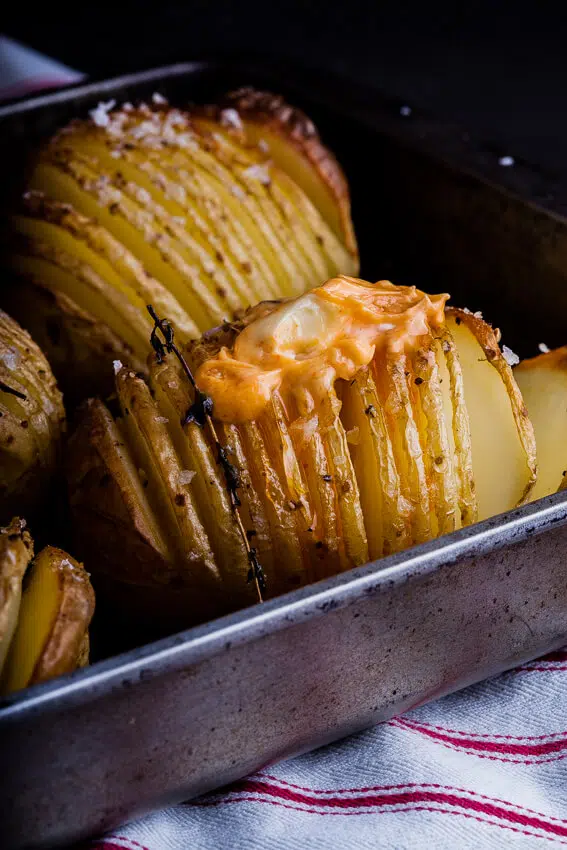 Hasselback potatoes with sriracha butter