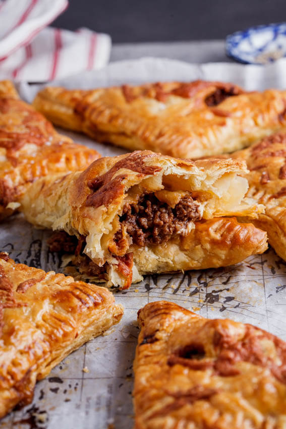 Cheesy bolognese pies