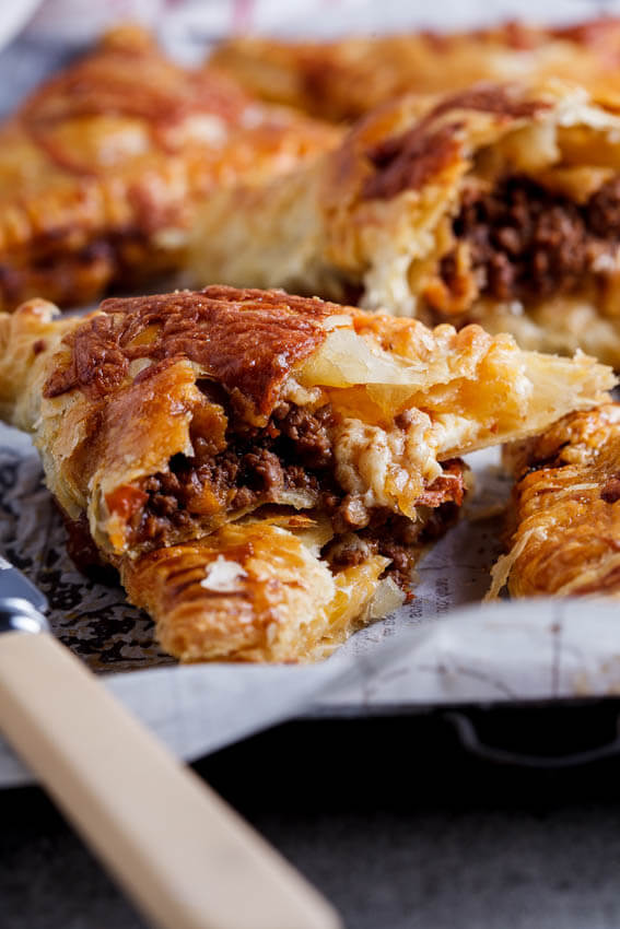 Cheesy bolognese pies