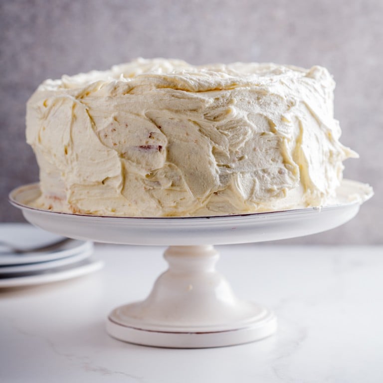 Lemon yoghurt layer cake with white chocolate frosting Simply Delicious
