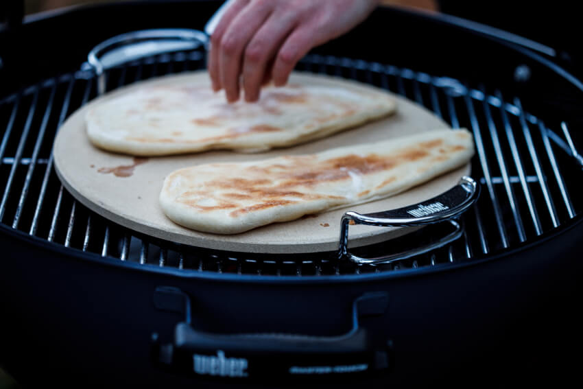 Naan bread cooking