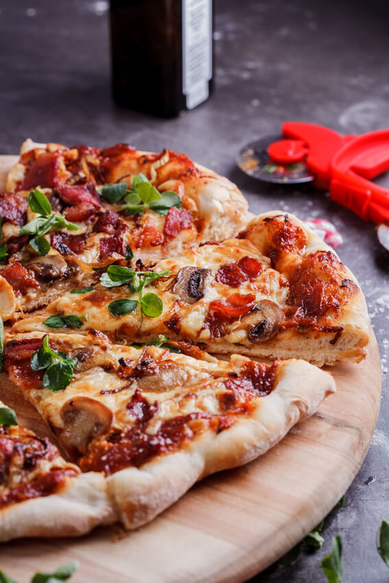 Bacon, mushroom and onion pizza