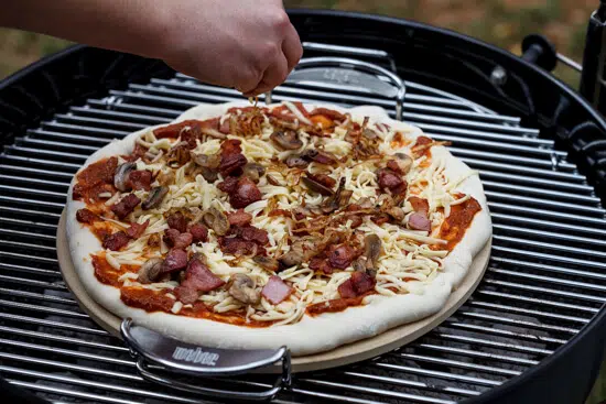 Bacon, mushroom and onion pizza