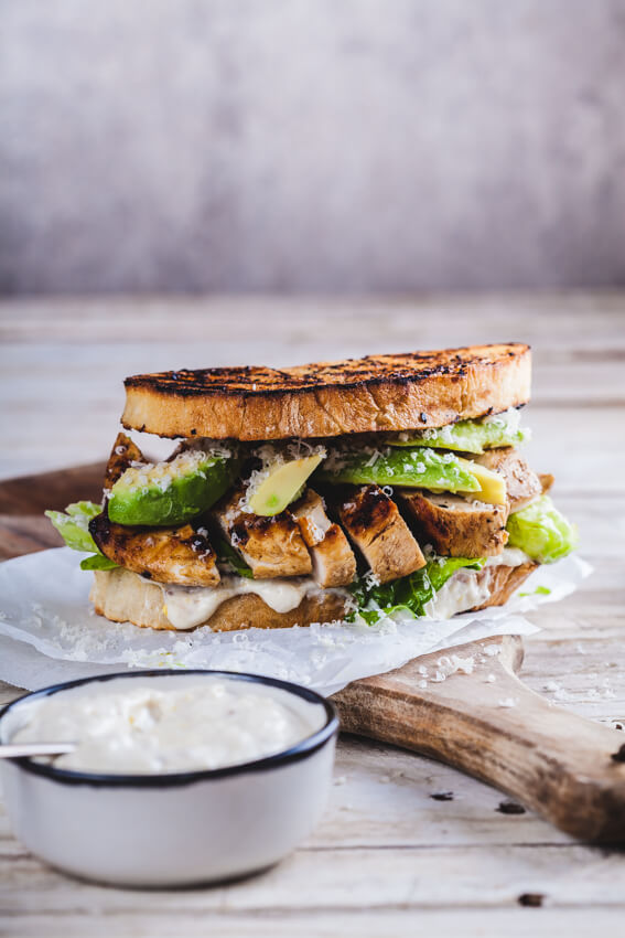 Perfect chicken Caesar sandwich with juicy grilled chicken, crisp bread and a healthier, no egg Caesar dressing that will blow your mind.