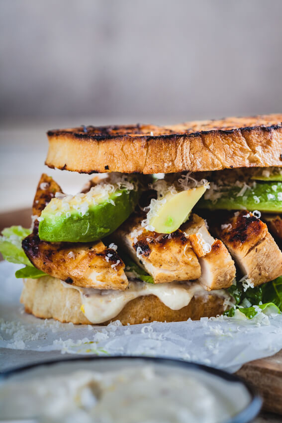 Perfect chicken Caesar sandwich with juicy grilled chicken, crisp bread and a healthier, no egg Caesar dressing that will blow your mind.