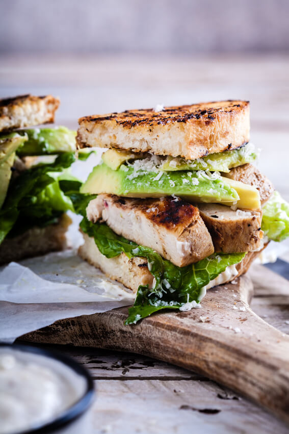 Perfect chicken Caesar sandwich with juicy grilled chicken, crisp bread and a healthier, no egg Caesar dressing that will blow your mind.