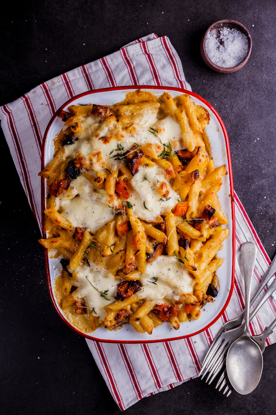 Creamy penne pasta bake studded with cubes of sweet, roasted butternut squash and chunks of buffalo mozzarella, flavored with fresh thyme.