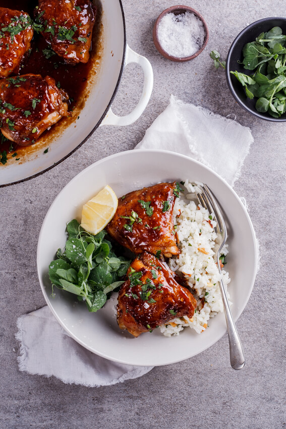 Easy, delicious sticky apricot chicken flavored with a little soy sauce and chilli flakes is a perfect dinner when served with almond and lemon pilaf rice.
