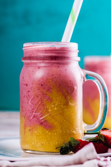 Creamy pineapple and strawberry breakfast smoothies