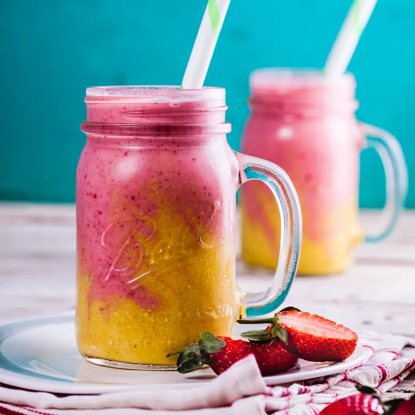 Creamy pineapple and strawberry breakfast smoothies