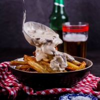 French fries with creamy mushroom sauce