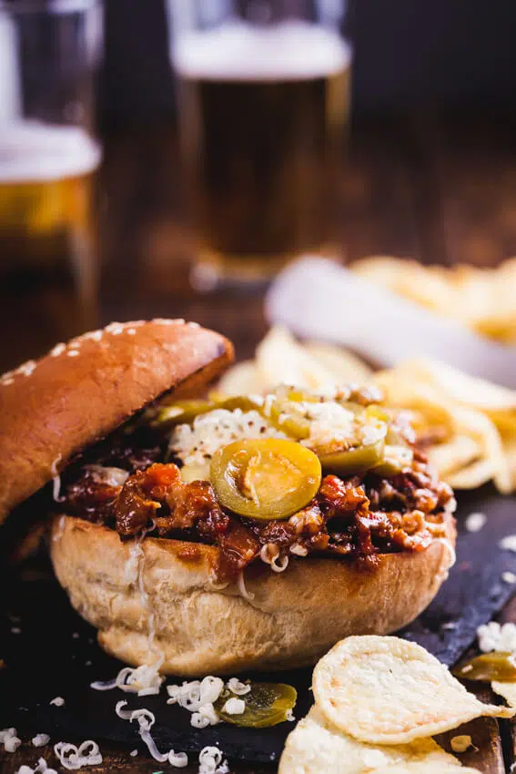 Big, gooey slow-cooked, shredded beef Sloppy Joes topped with sharp mature cheddar and tangy pickled jalapeños is your childhood favorite beefed up.