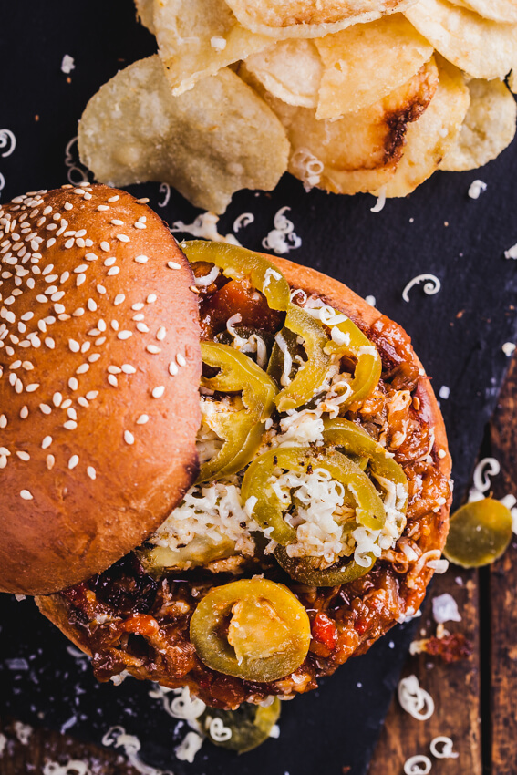 Big, gooey slow-cooked, shredded beef Sloppy Joes topped with sharp mature cheddar and tangy pickled jalapeños is your childhood favorite beefed up.