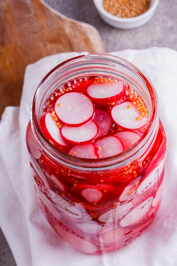 Easy pickled radish with pickling spice in jar