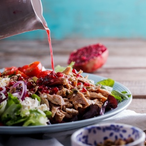 Leftover roast chicken is perfect used in this aromatic Moroccan chicken salad recipe. Juicy cherry tomatoes, crisp cucumber, pistachios and pomegranate rubies along with a spiced, fragrant dressing take this lunchtime staple to a whole other level.