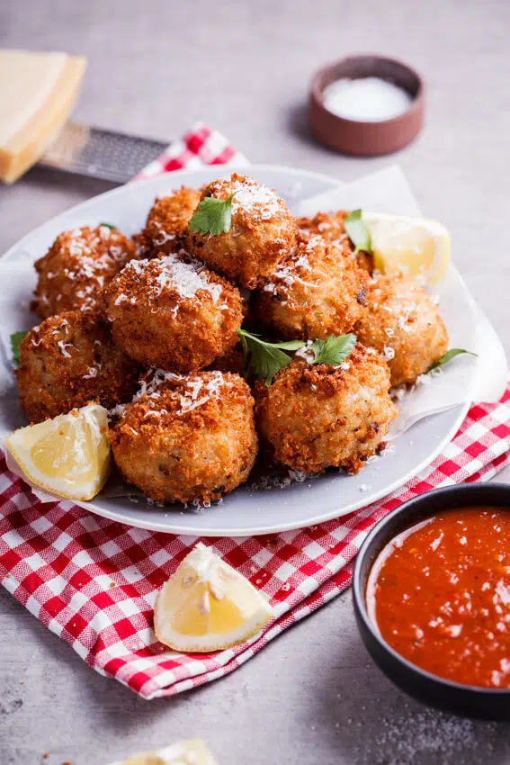 Mushroom arancini with mozzarella and roasted tomato sauce