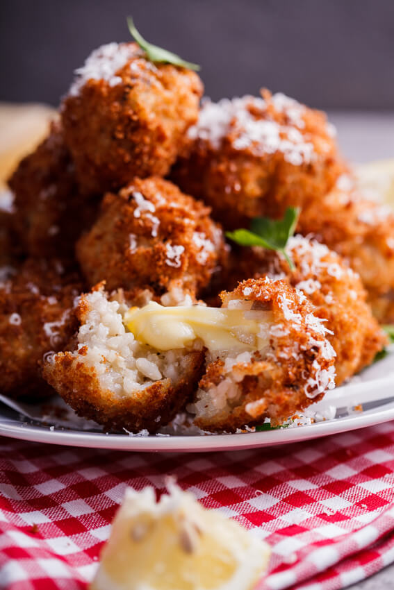 Mushroom arancini with mozzarella and roasted tomato sauce