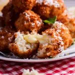 Mushroom arancini with mozzarella and roasted tomato sauce