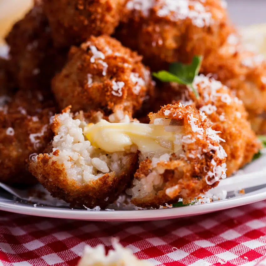 Mushroom arancini with mozzarella and roasted tomato sauce