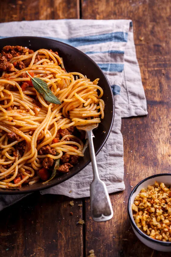 Pork bolognese with cheesy pangrattato