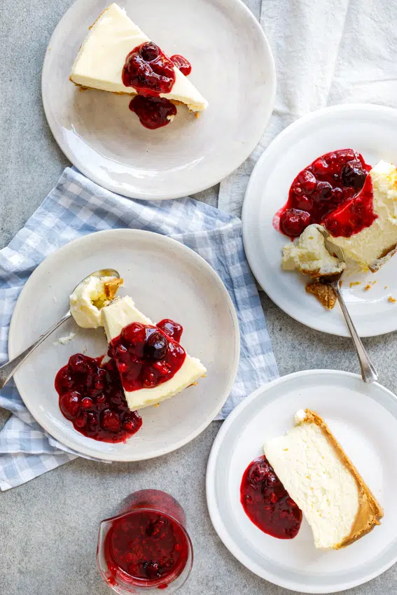 Classic baked cheesecake with easy berry sauce