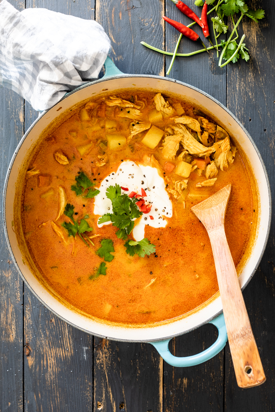 Chicken curry soup in blue pot