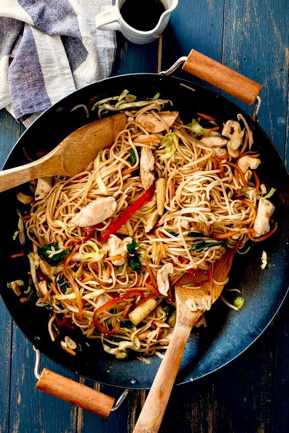 Easy 20-minute chicken stir fry in black wok.