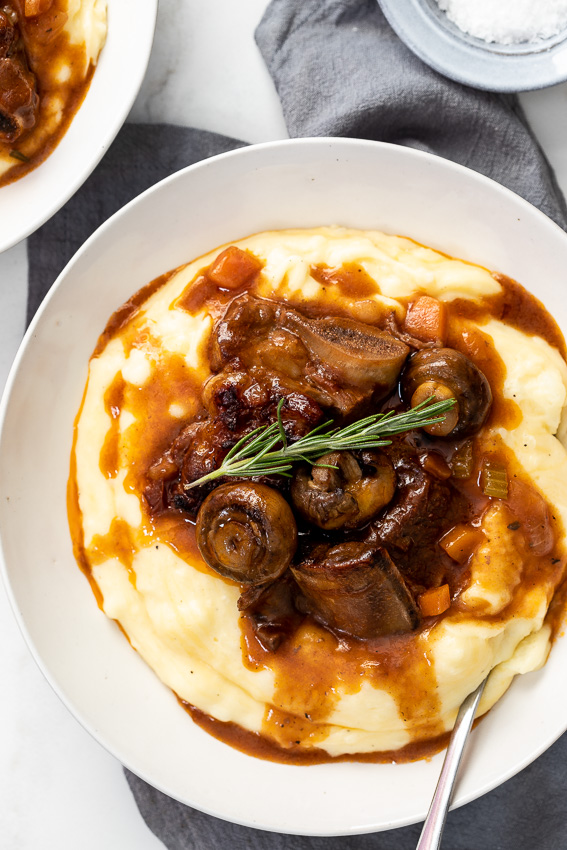 Slow braised beef short ribs with cheesy mash