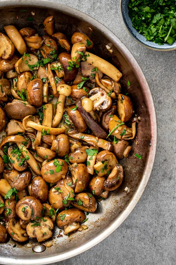 Creamy mushrooms in pan