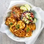Cheesy corn cakes with avo salsa