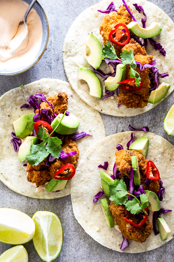 Crispy fish tacos with hot sauce crema