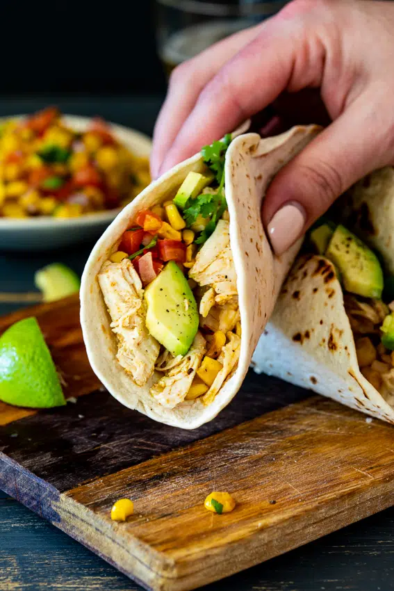 Shredded chicken tacos with corn salsa