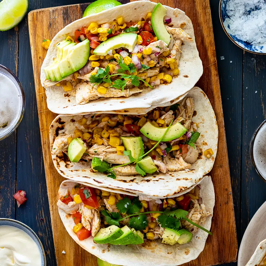 Shredded chicken tacos with corn salsa