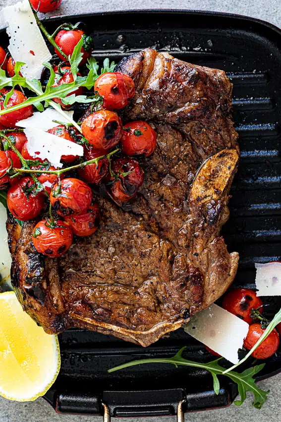 Grilled steak with blistered tomatoes Grilled steak with blistered tomatoes